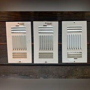 White ceiling vent covers